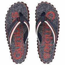 Grå flip-flops med tekstilremme og mønstret gummisål.