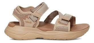 Beige og sorte sandaler med justerbare remme.